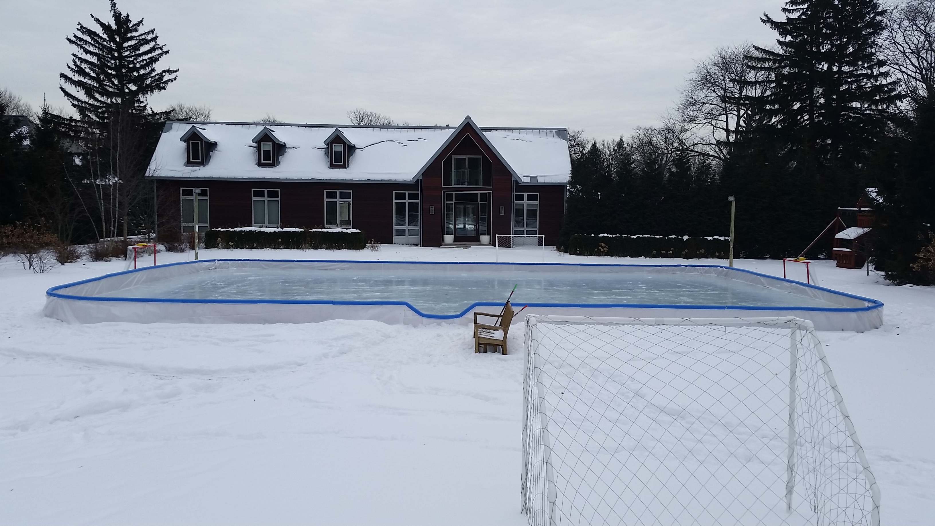 Backyard rink with rounded corners.  24